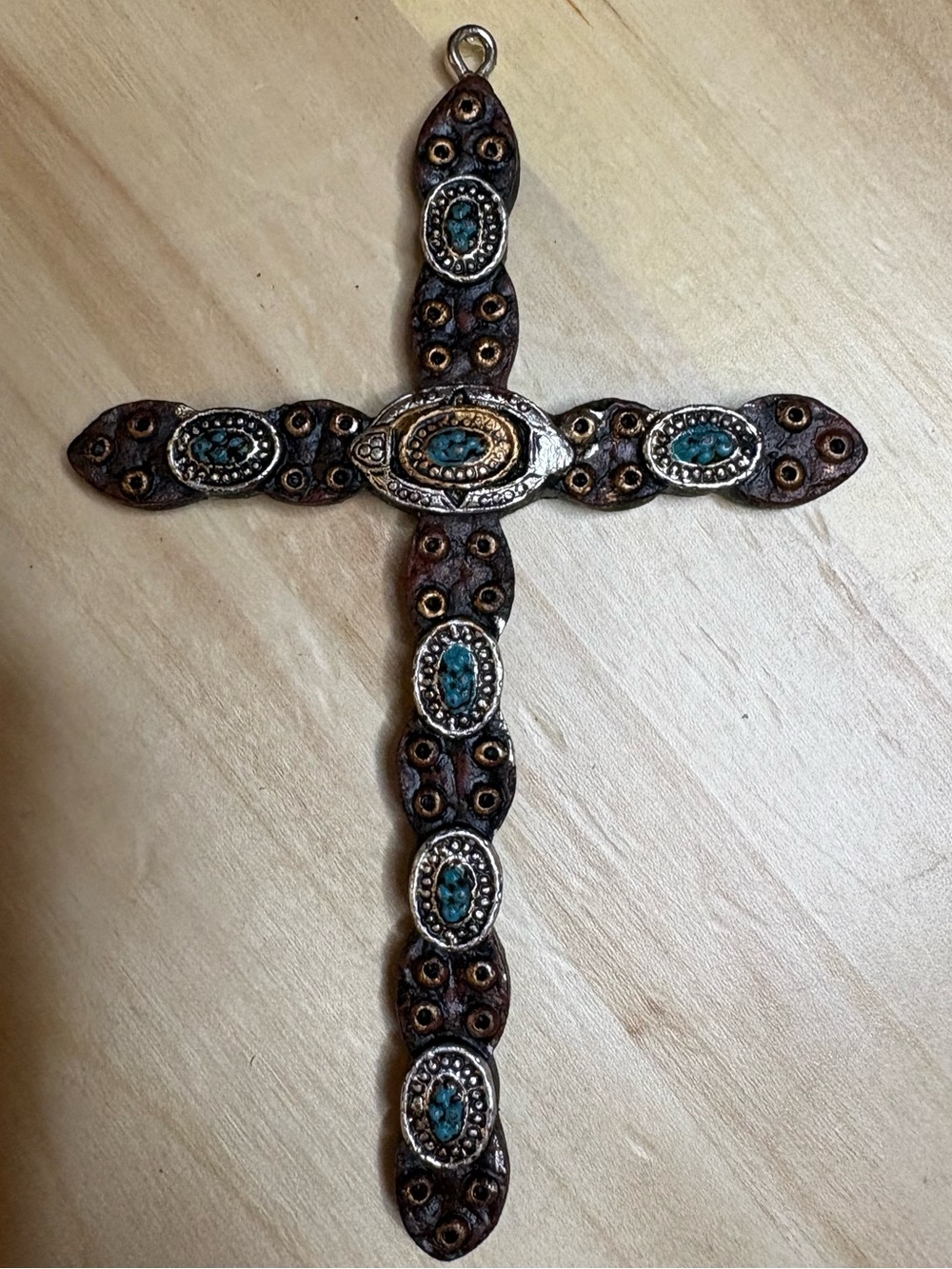 rustic western-style cross, made of poly-resin to resemble distressed wood